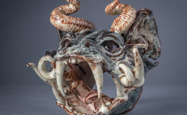 A clay gargoyle head made by Brynn Keevil '23