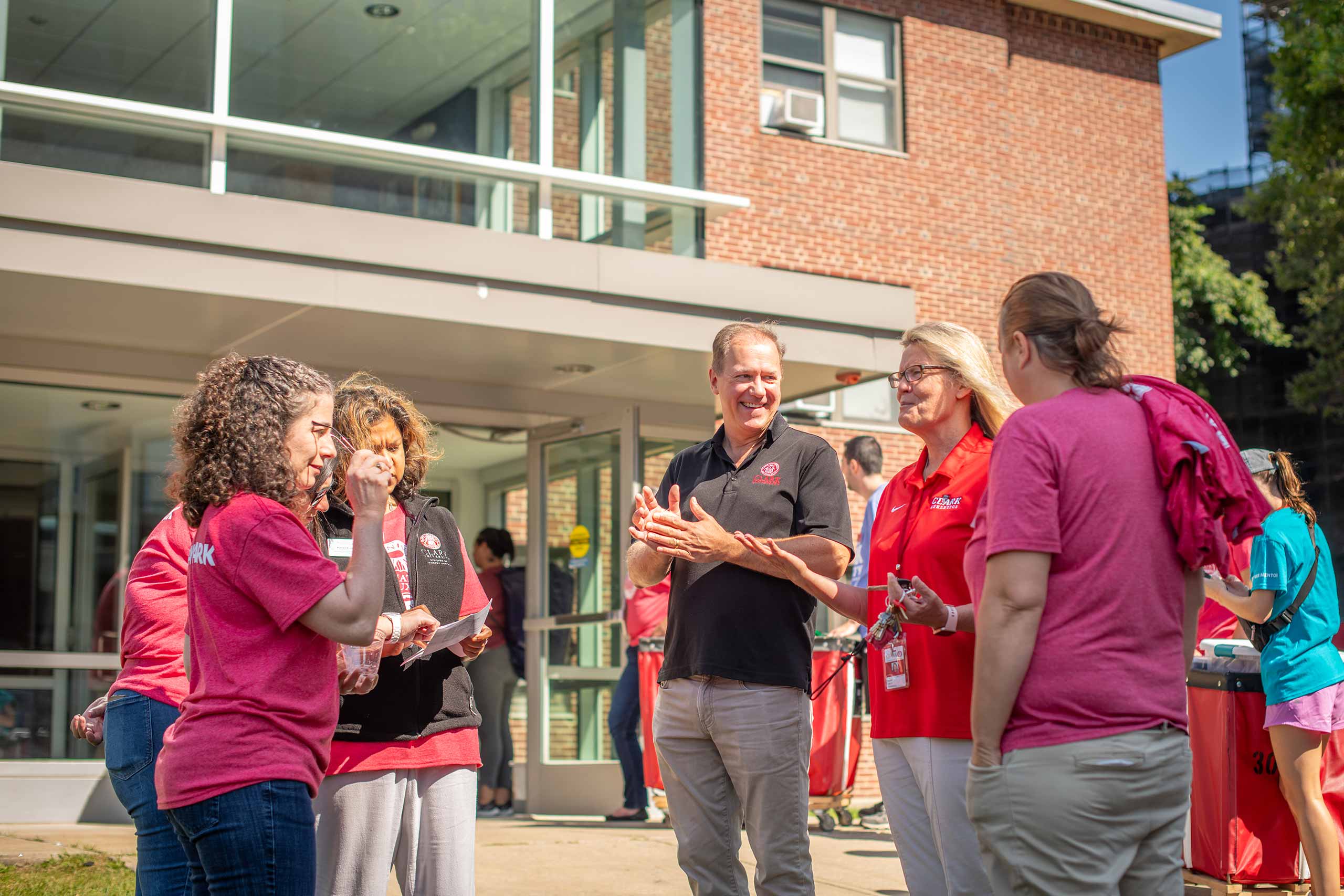 President David Fithian talking with staff members on move-in day 2023