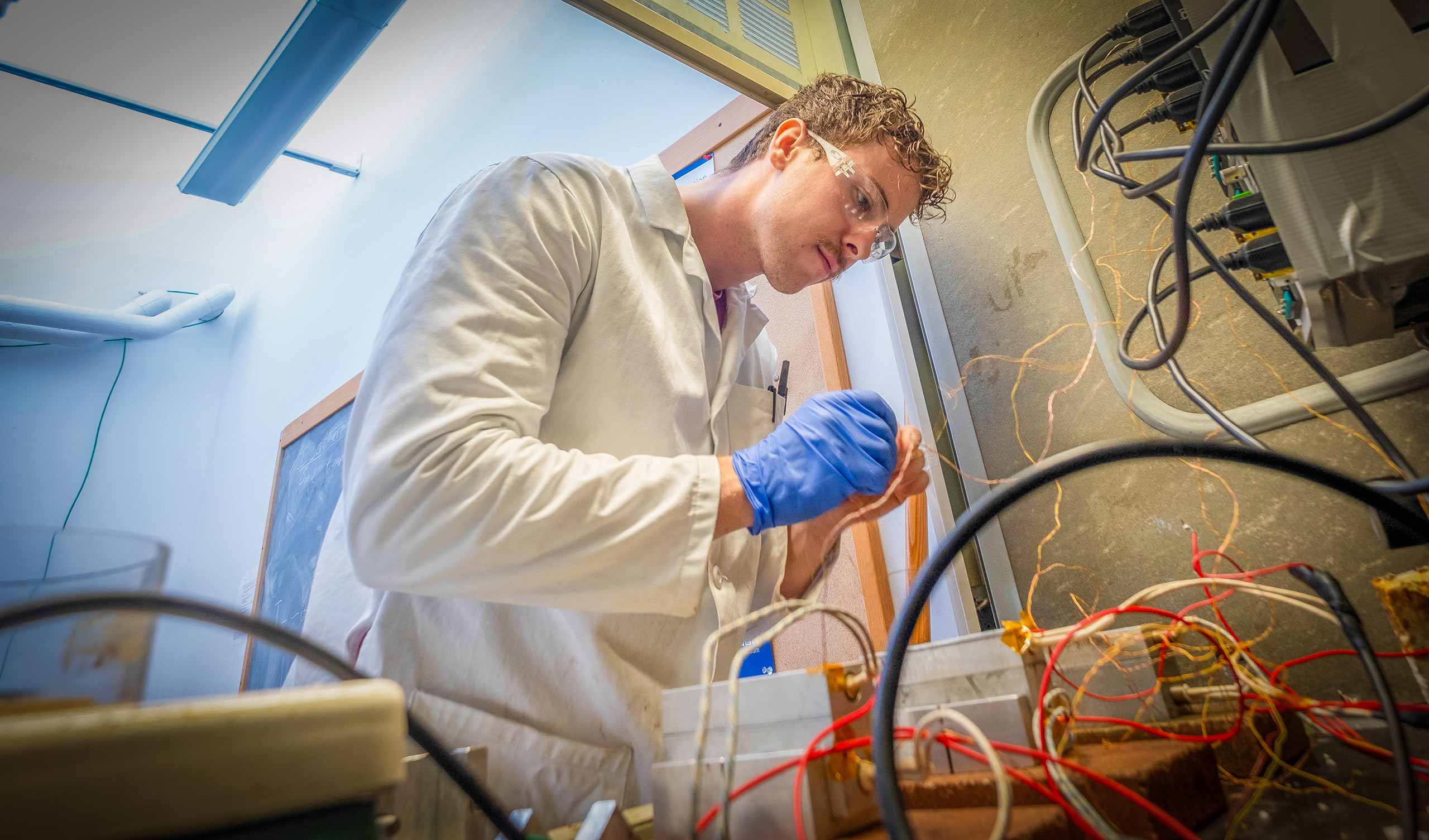 Tom Esdale works in the Spratt Biochemistry lab, Sackler Science Building