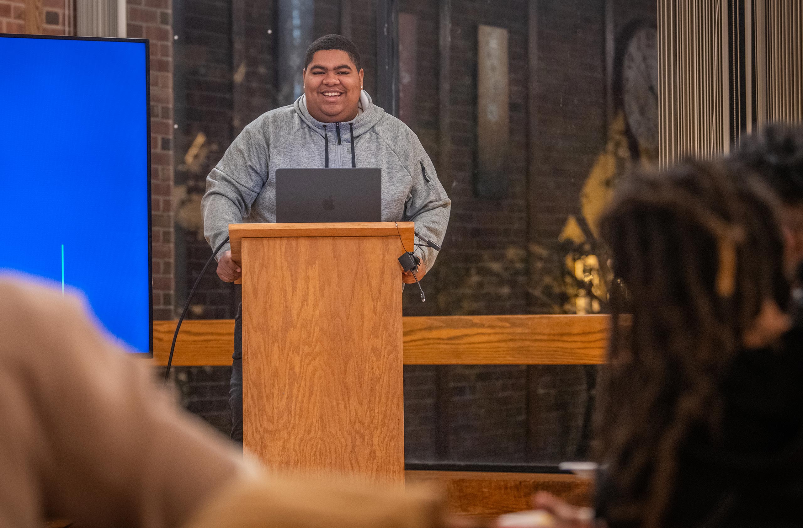 William Stafford '26 facilitates the conversation at an event held by the Men of Color Alliance at Clark University