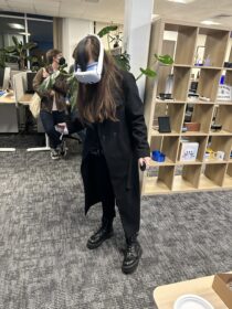 student wearing VR glasses