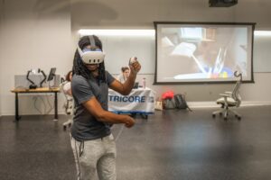 student wearing VR glasses