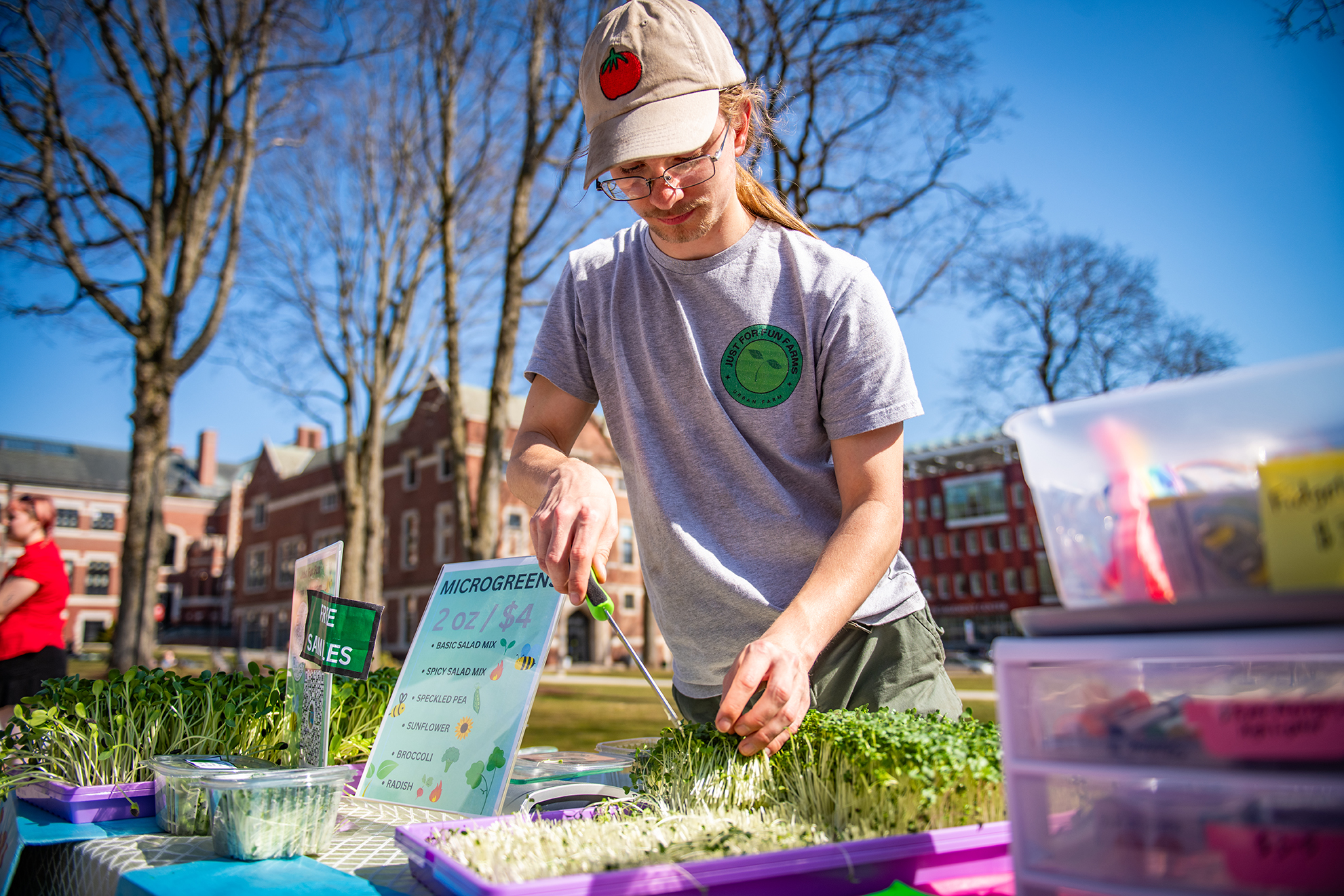 Owen Chase sells microgreens at a recent Clark Collective Pop-Up in Red Square.