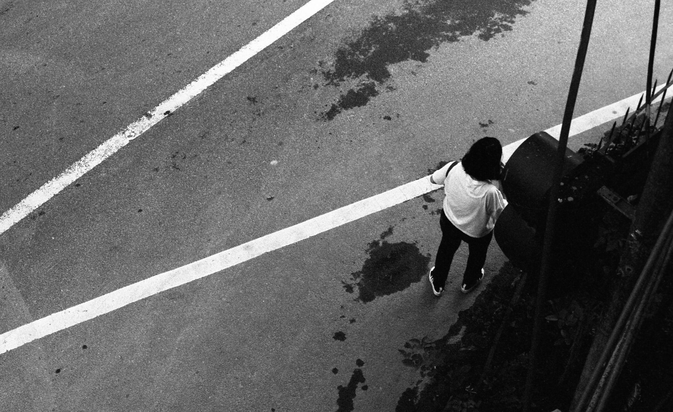 woman walks on road