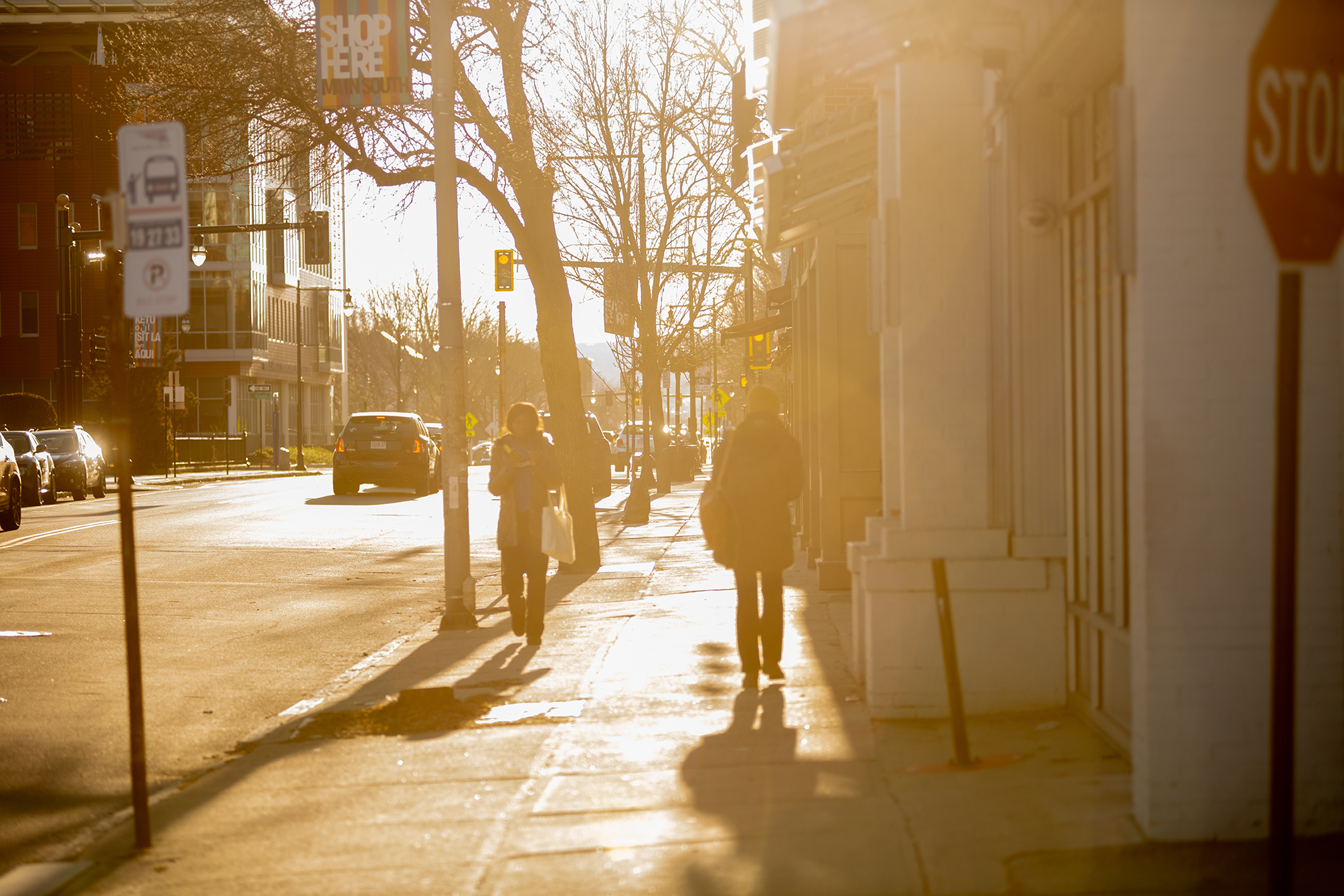 Students walking on Main Street by the Clark University campus